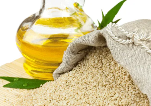 یک بسته کنجد در کنار روغن کنجد برای وبلاگ خواص شگفت انگیز ارده برای بدن